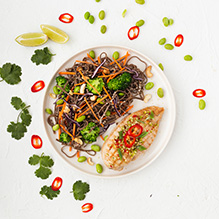 lunch in a low GI box diet - grilled turkey breast in lime marinade with chilli, soba noodles with edamame beans, broccoli and carrot